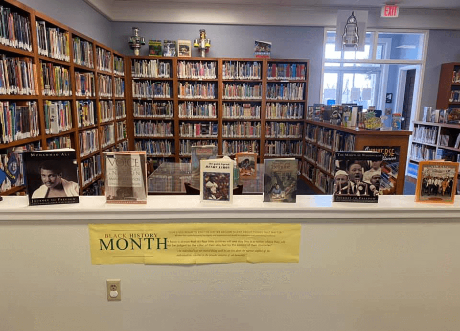 A book display for Black History Month in one corner of the Innis Library branch.